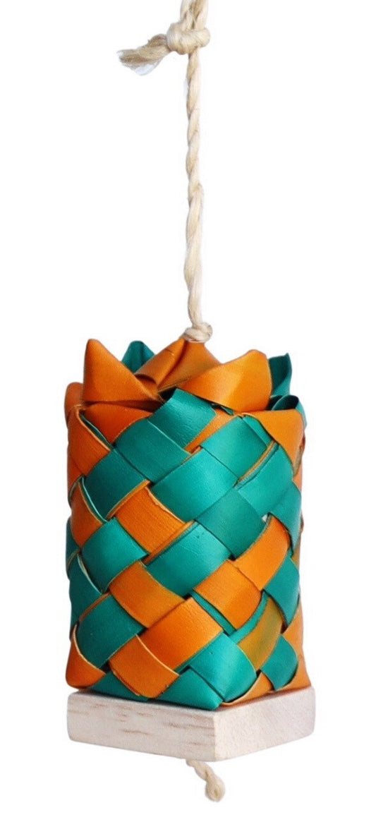 Vibrant Happy Beaks Treasure Chest toy for birds, featuring a woven capsule filled with coco, wood, and cuttlebone.
