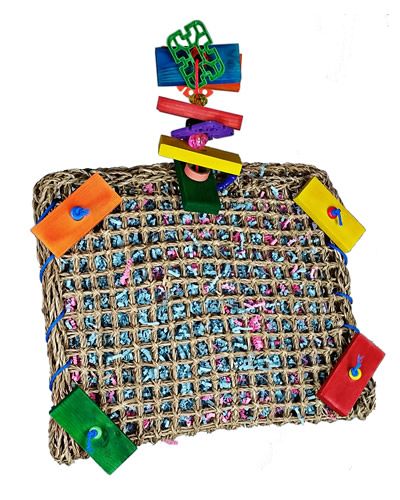 Colorful Vine Mat Forage Pouch for birds, packed with crinkle paper, beads, bagels, a woven star, and wooden pieces.