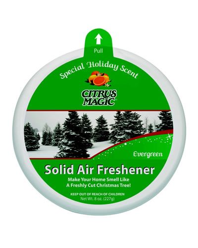 Refreshing 7oz Citrus Magic Evergreen Solid Air Freshener, emanating a crisp, holiday-inspired citrus and pine scent.