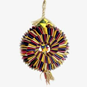 Vibrant bird toy with a circular origami design of natural fibers, topped by a star, perfect for large birds to shred.