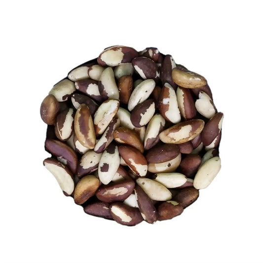 Pile of Brazil nuts on a white background