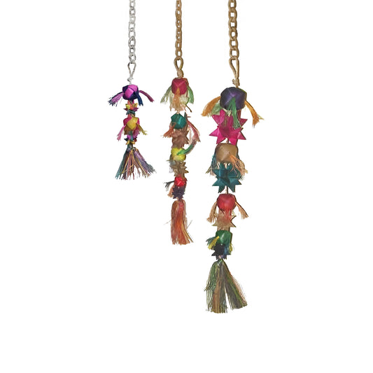 Vibrant Mini Ball and Stars toy from Planet Pleasures, crafted from palm leaf with colorful, shreddable textures for birds.