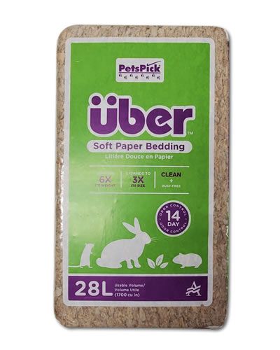 Soft, natural Uber 28 Liter Bedding in a fluffy pile, ideal for bird nesting with dust-free, odor-controlling comfort.
