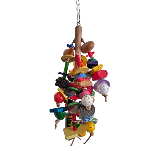 Colorful bird toy with dangling beads and textured shapes, designed to entertain and engage pet birds with fun play.