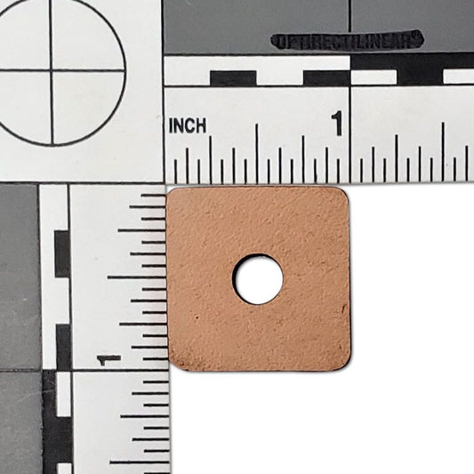 Small 1-inch by 1-inch vegetable-tanned leather squares in a natural tan shade, perfect for crafting safe bird toys.