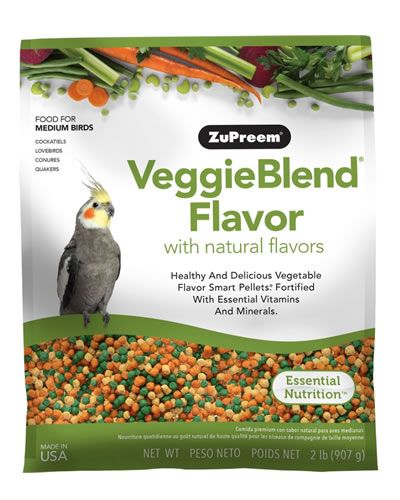 Vibrant Zupreem VeggieBlend pellets for medium birds, bursting with colorful veggie hues and natural flavors.