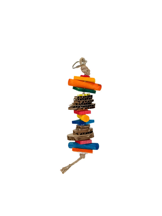 Vibrant bird toy with colorful pine wood blocks, cardboard bits, and natural jute rope, perfect for foraging and play.